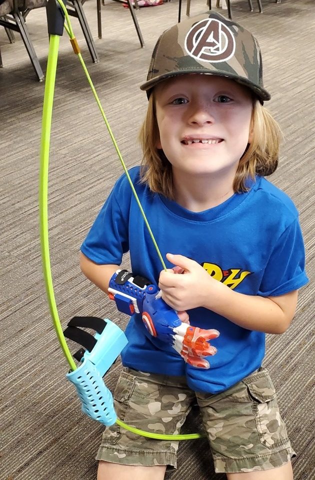 e-NABLE Volunteer Cam Haight sharing his design for a bow holder at EnableCon 2019