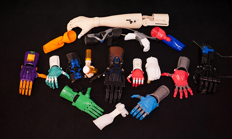 A collection of 3D printed hands designed by e-NABLE volunteers