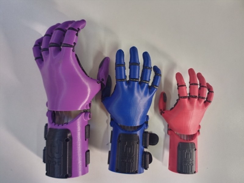 "The Kinetic Hand printed in 3 sizes and 3 colors" 

